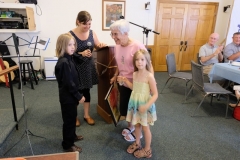 17 Josh and Luci Quibell present Ruth Nelson with the Sunday School Hands as Ruth retires from Sunday School after many years of devoted service